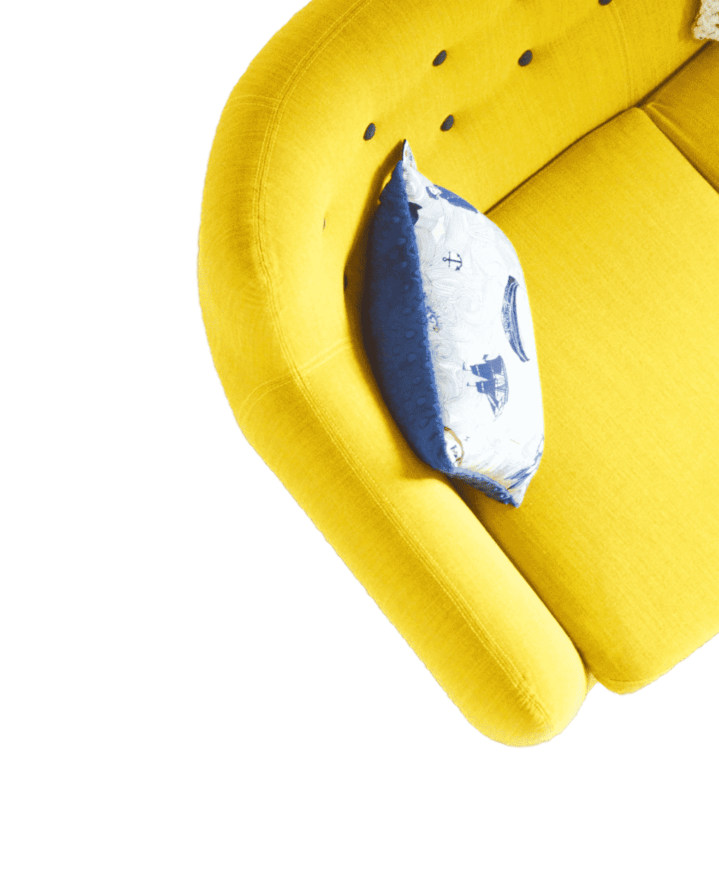 Yellow armchair with blue pillow