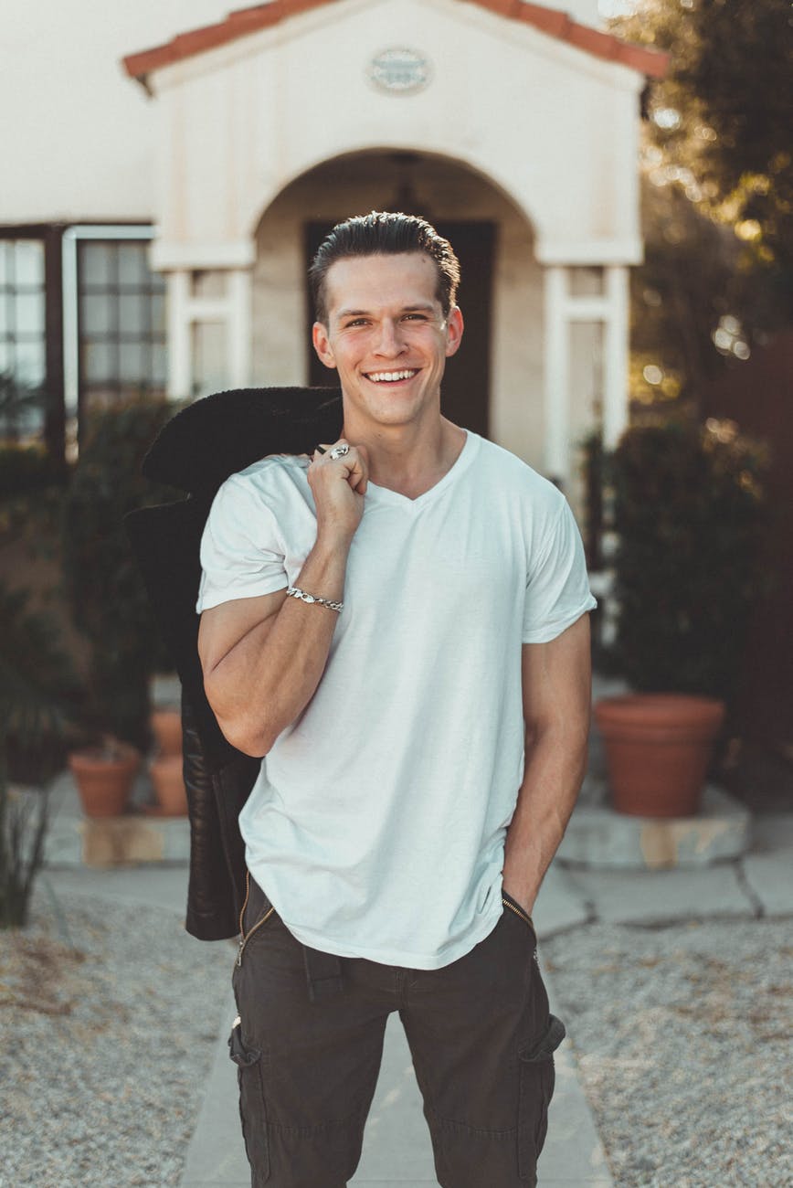 Young smiling man with white tshirt
