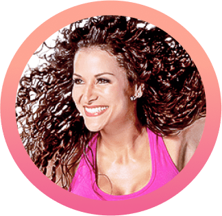 zumba instructor with hair moving in the air
