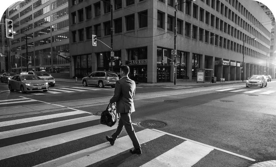 a man walks along the road