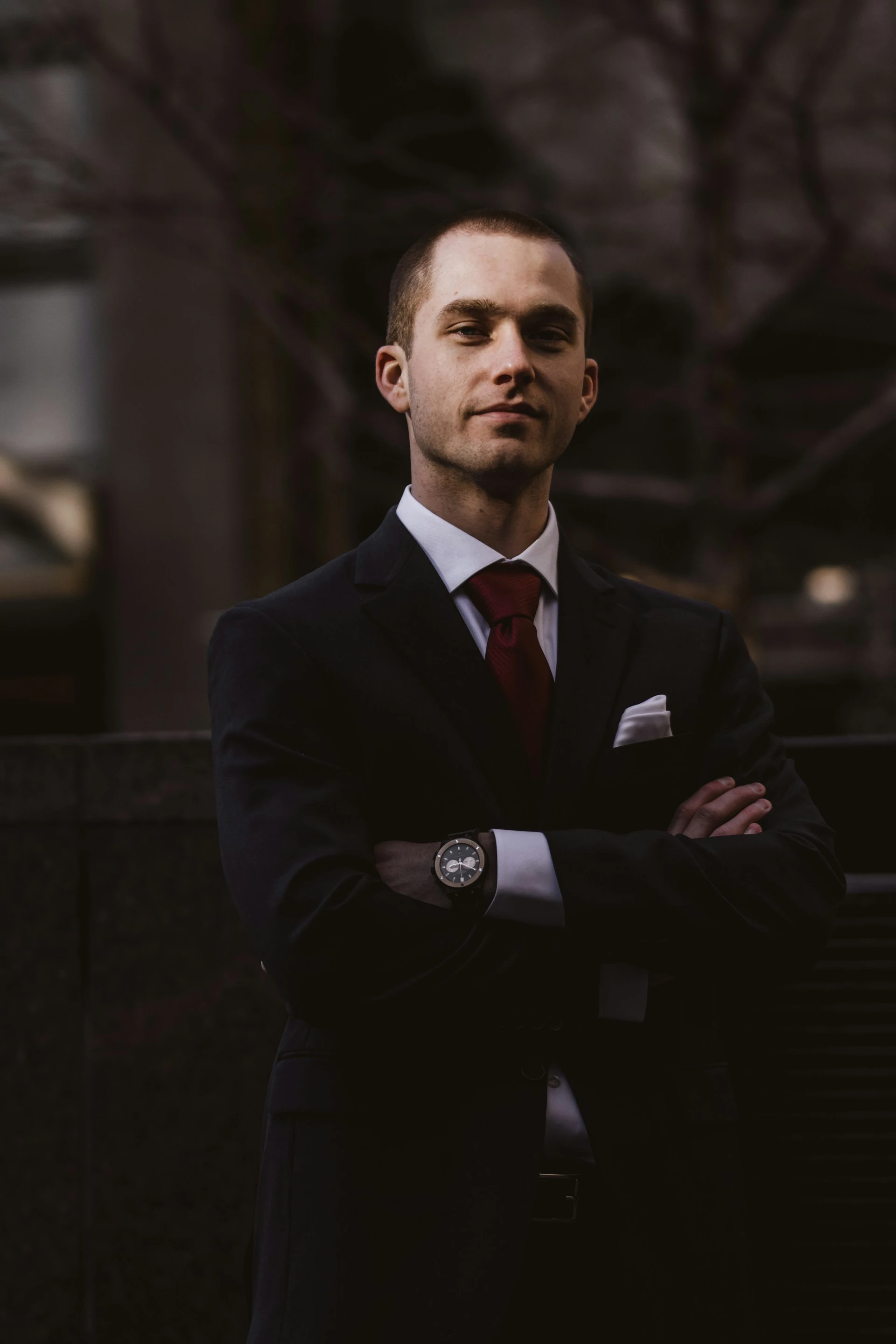 photo used for a photography website with a man in a black suit wearing a watch