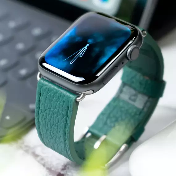 Wrist watch with green strap