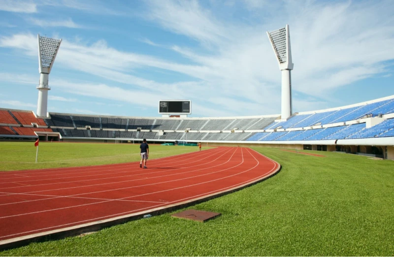 a large field with tracks for running