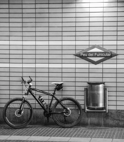 bike-parked-near-trashcan-in-german-underground