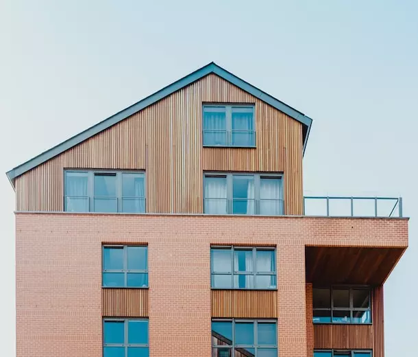 Wooden two-story house with a large terrace