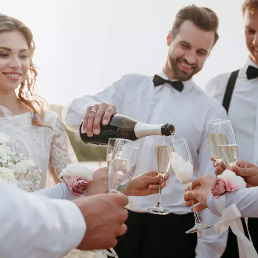 Man pouring champagne