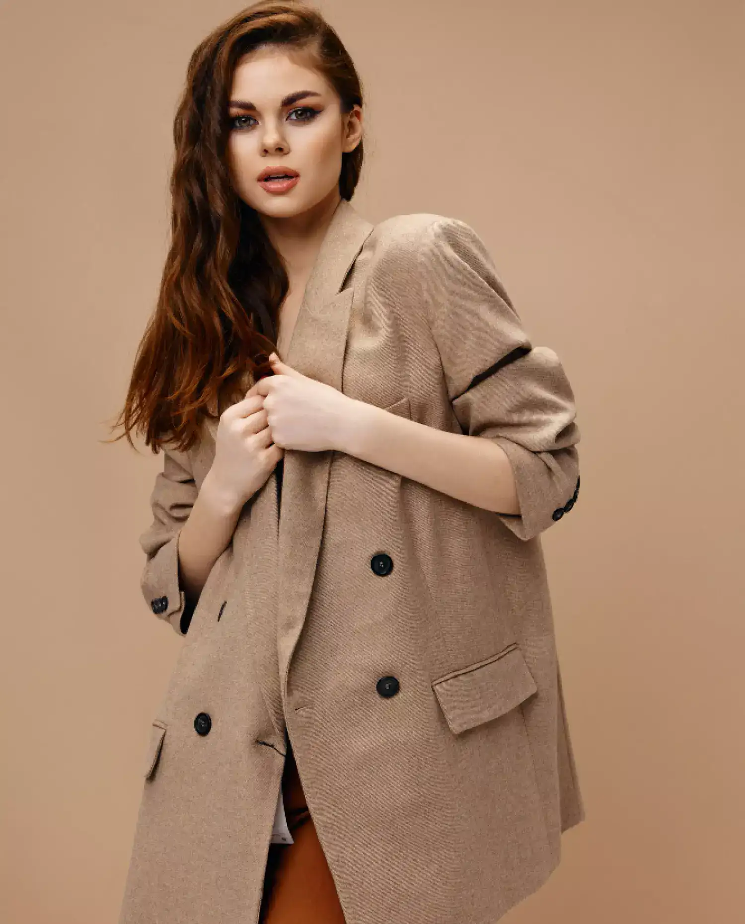 Girl in a brown coat