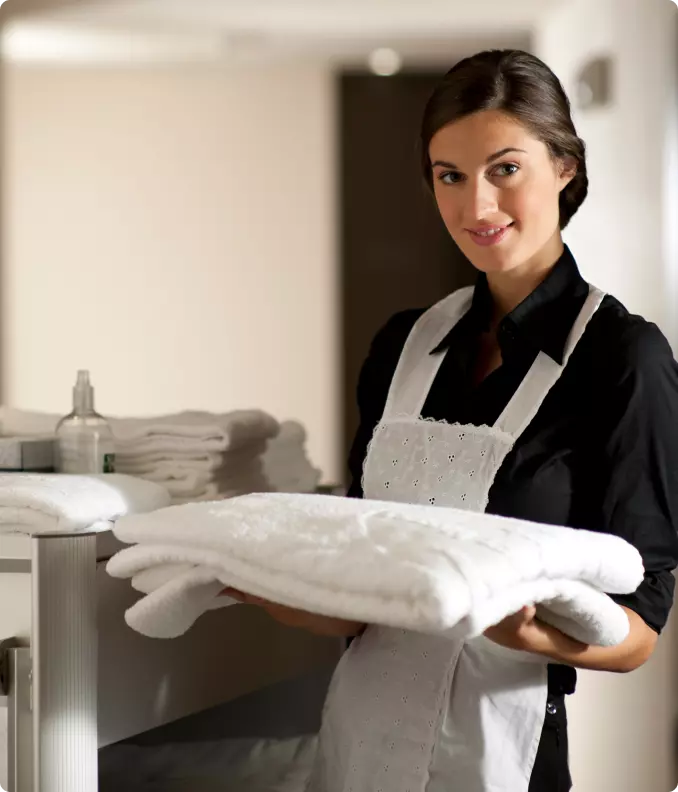 maid girl holding a tent in her hands