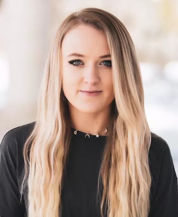 a girl with long blond hair