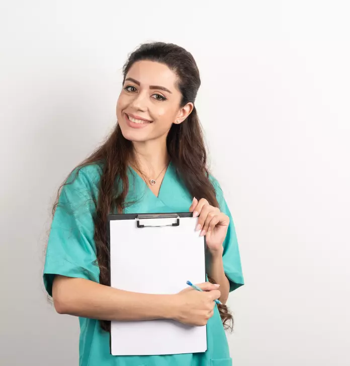 a woman doctor in a green coat