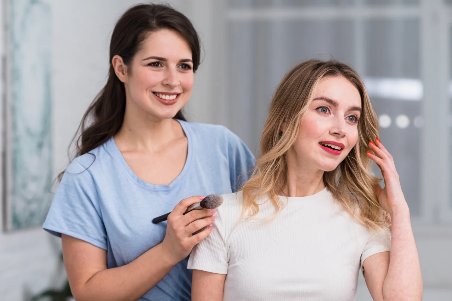 Two girls smiling