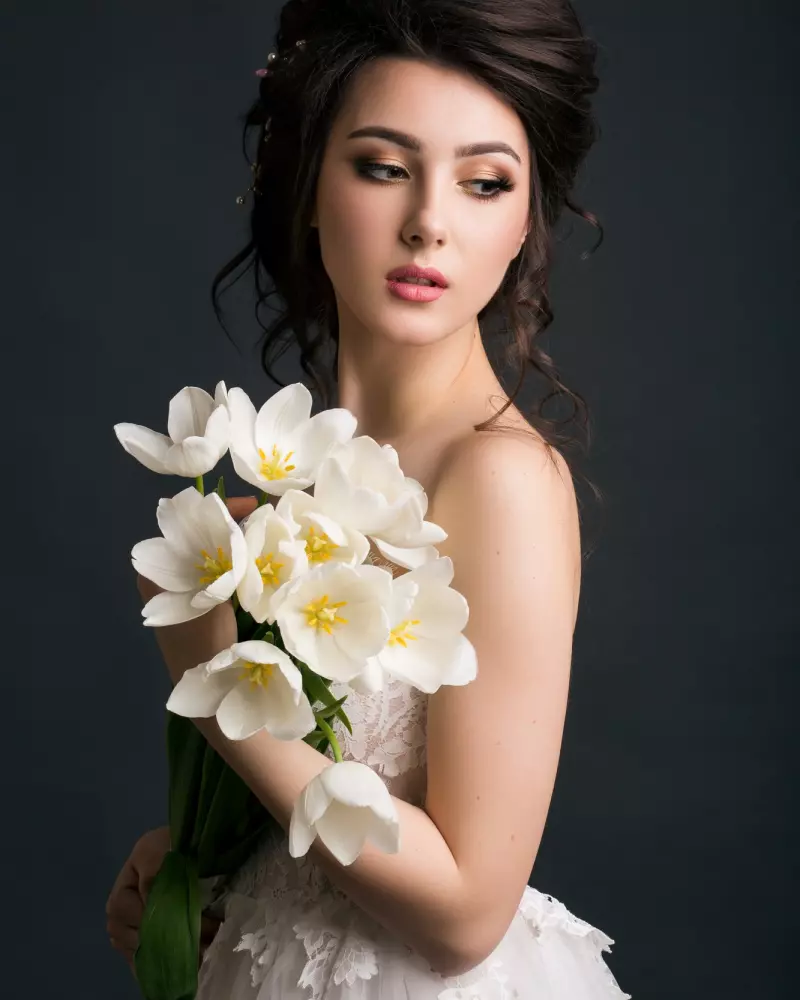 A girl with a bouquet of flowers