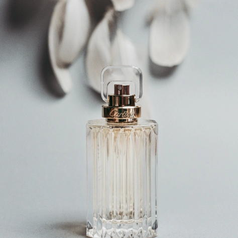 a beautiful perfume bottle in an oblong shape with a large number of edges