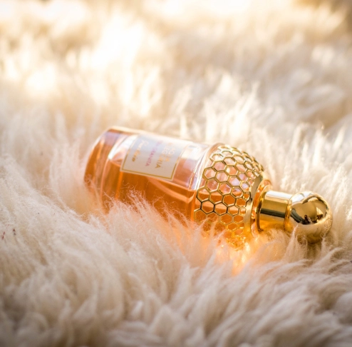 bottle with gold plated in sunlight