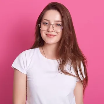 a girl in a T-shirt and glasses