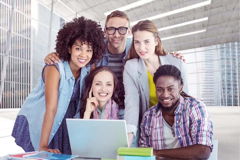 meeting of colleagues in front of a laptop