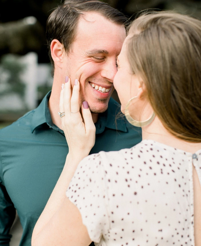 the bride and groom embrace