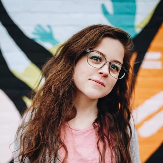 brown-haired girl in transparent glasses