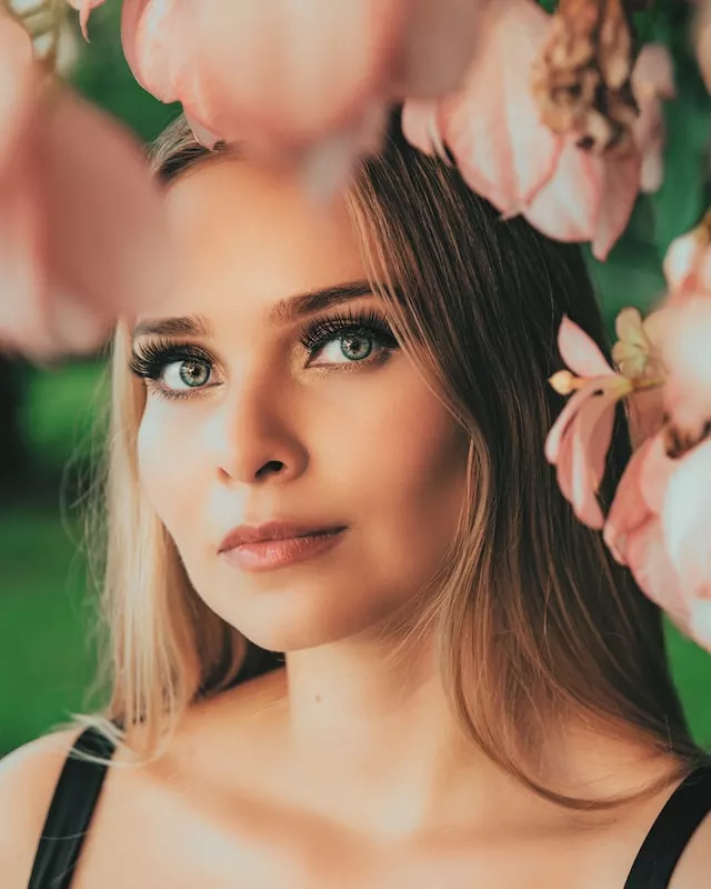 Blonde girl in flowers