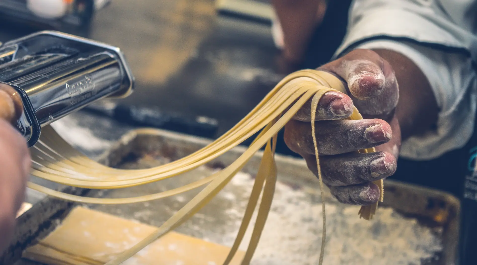 the cook creates flat spaghetti