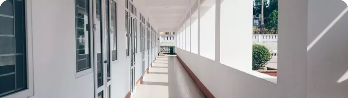 a long corridor with many doors